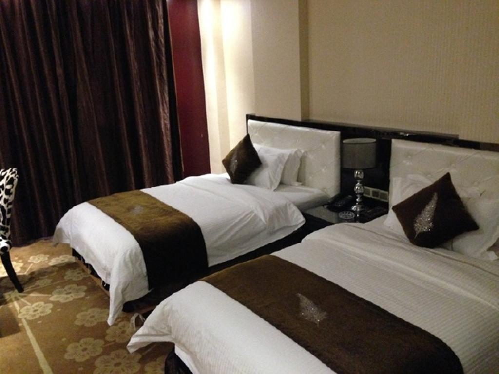 Tianguo Times Hotel Foshan Room photo