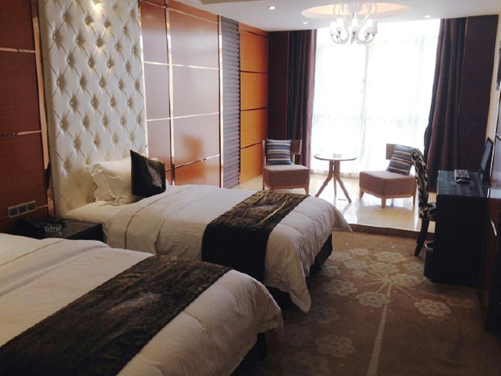 Tianguo Times Hotel Foshan Room photo