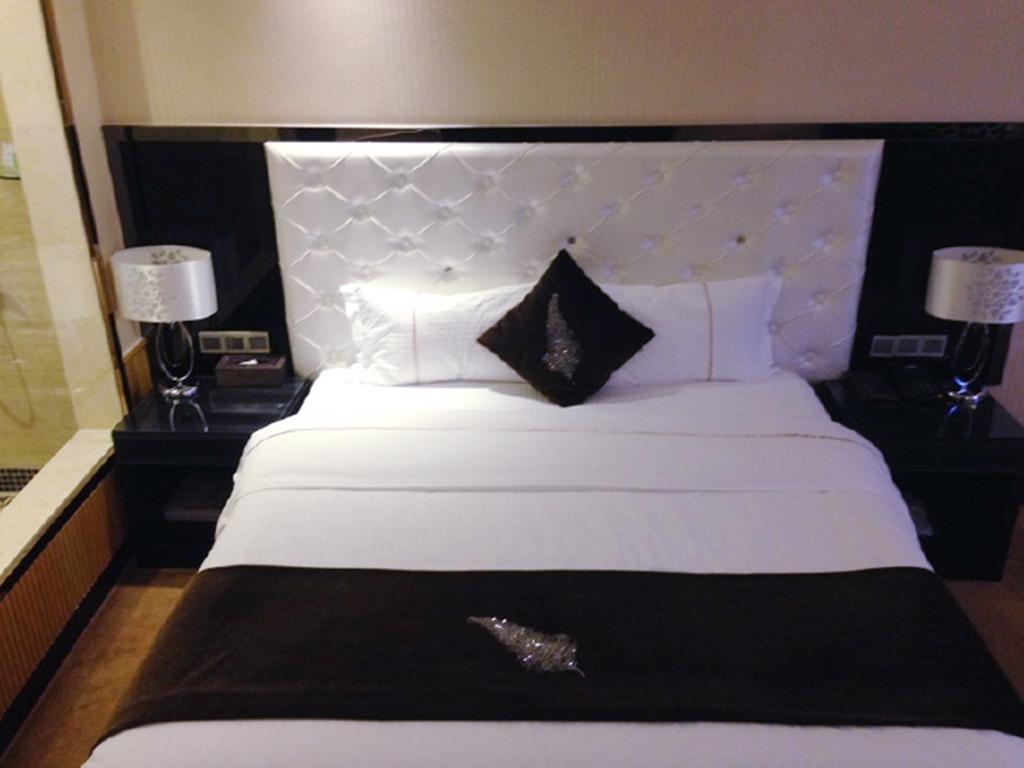 Tianguo Times Hotel Foshan Room photo